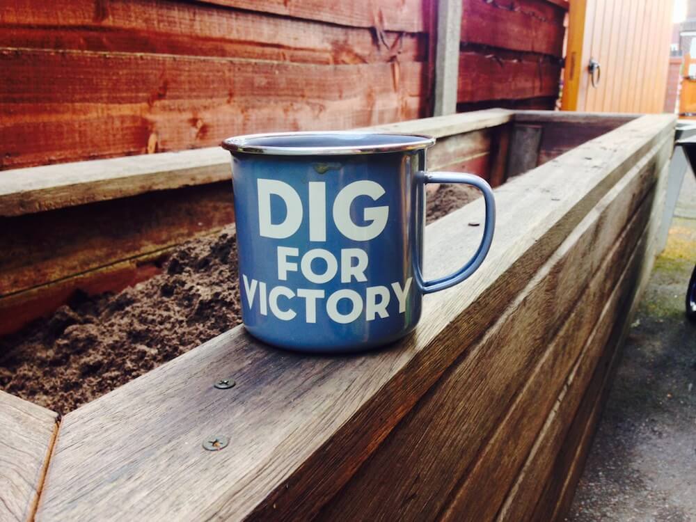 A mug with dig for victory on it