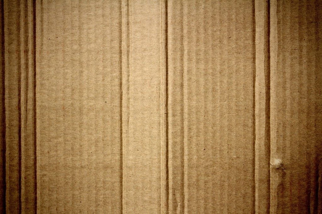 Sheets of cardboard to line gardening soil with that biodegrade