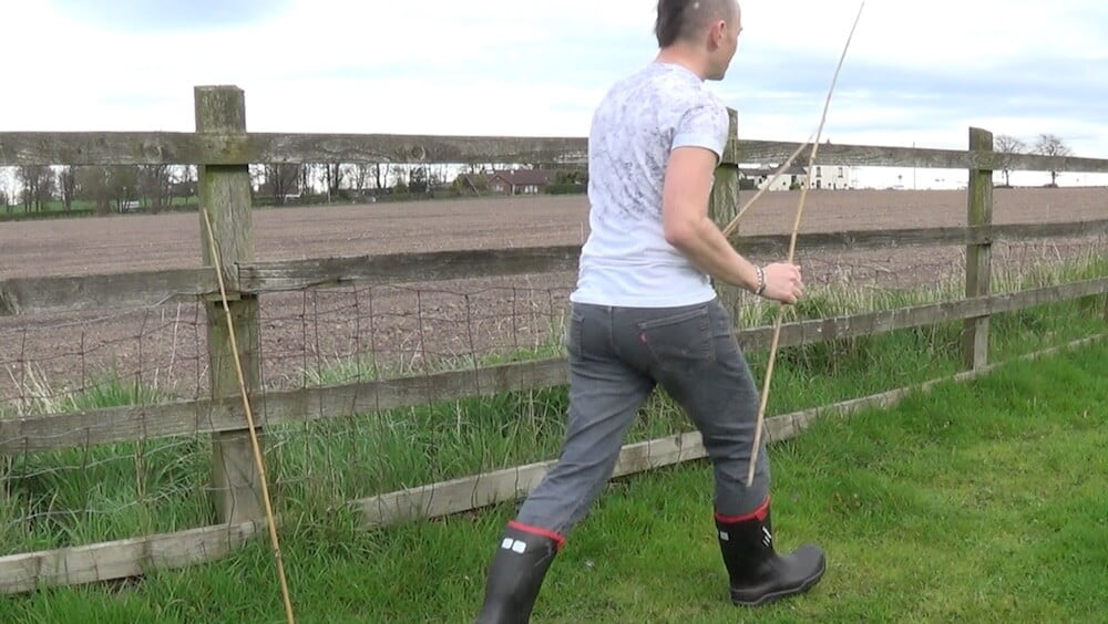 Garden Ninja planting up a long hedge