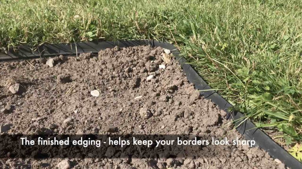 Neatly edged lawn with a plastic edging strip