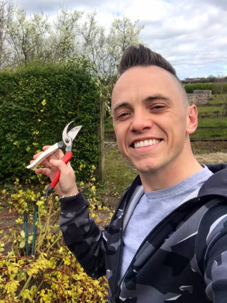 Grden Ninja holding secateurs