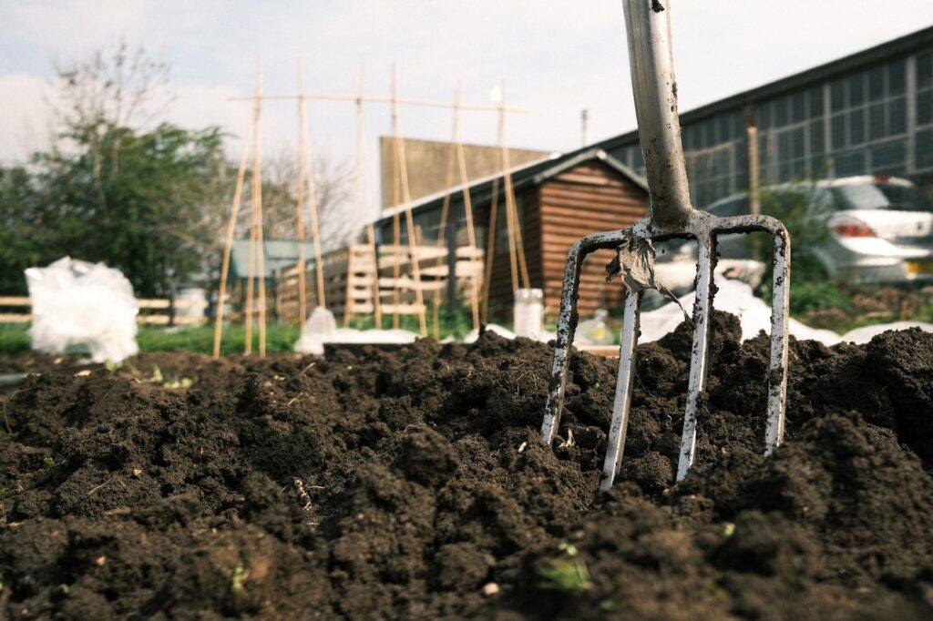 A fork in dug earth