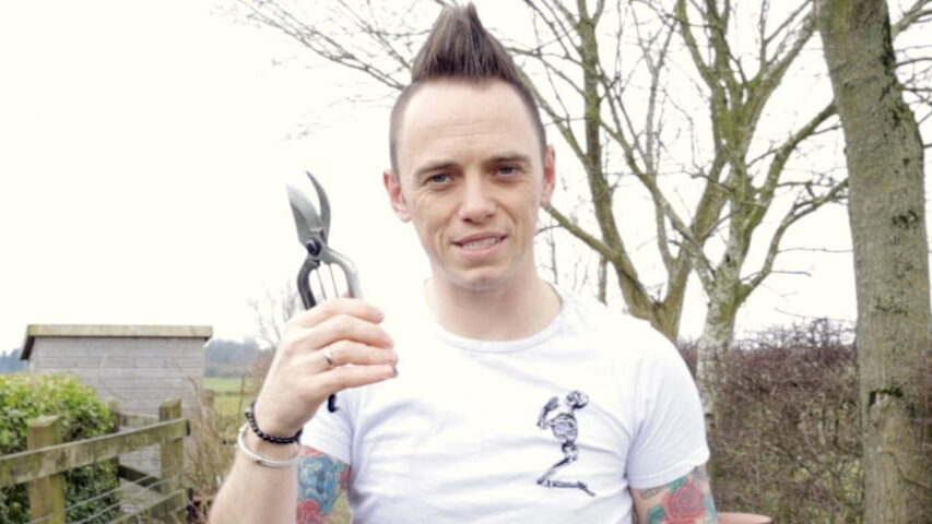Garden Ninja holding secateurs